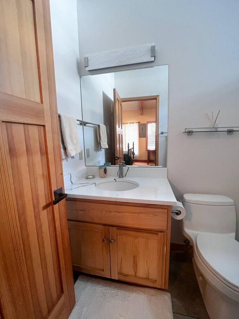 Guest bath vanity and mirror