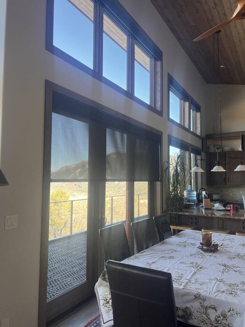 Mountain view kitchen with custom window coverings