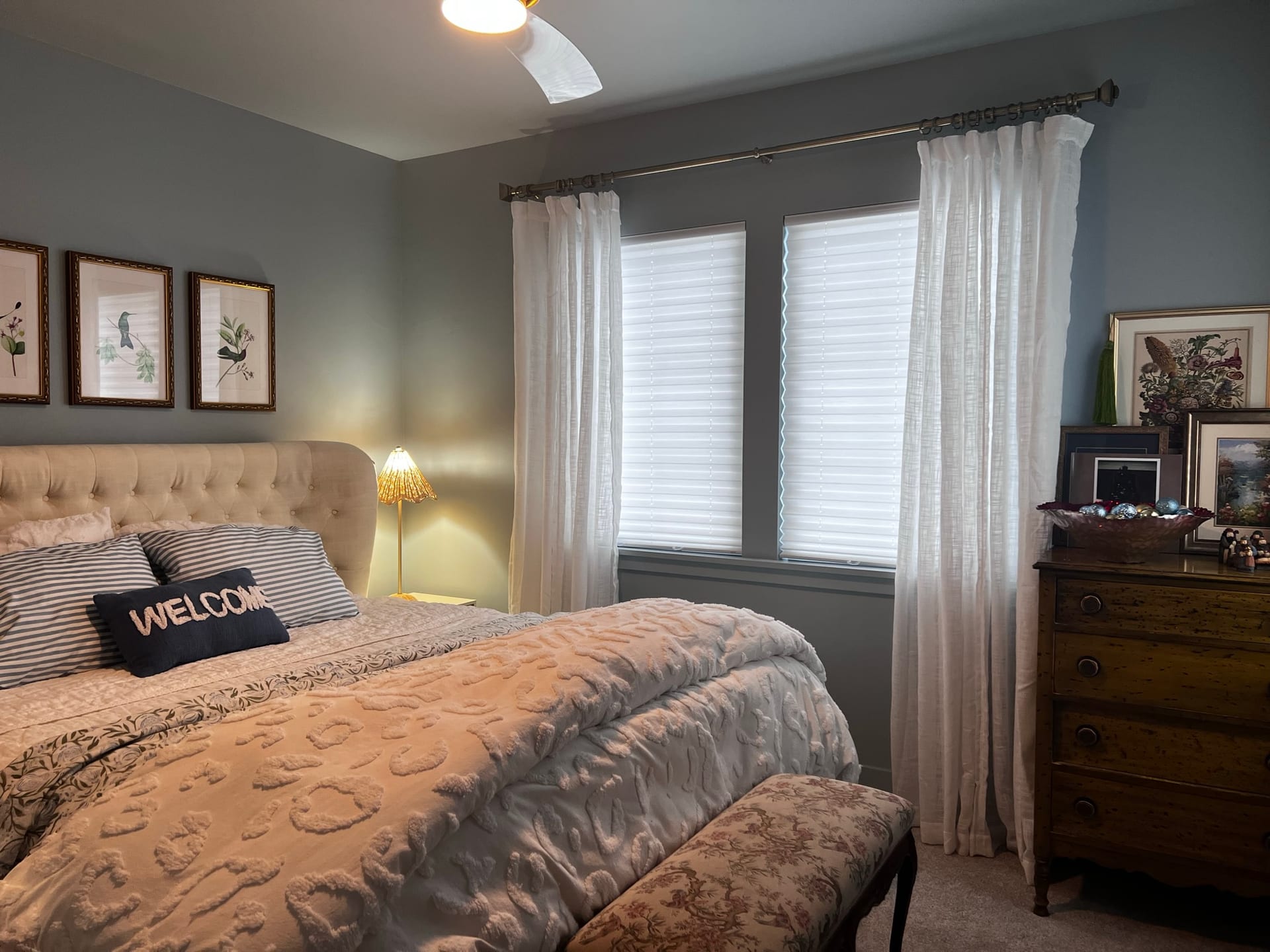 Layered drapery and light-filtering shades in a Durango bedroom — OM Design